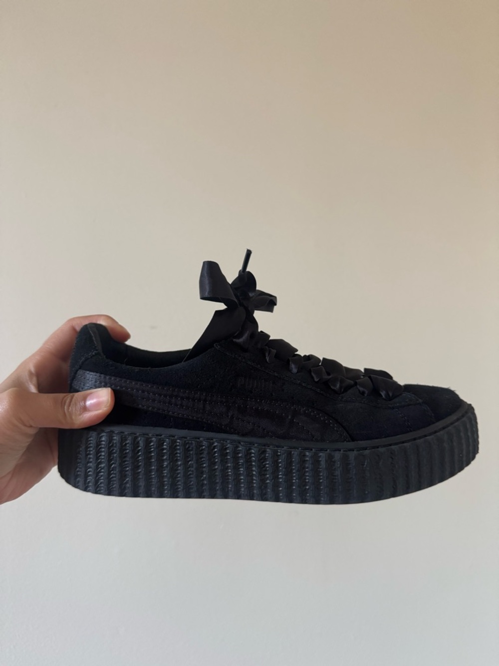Fenty puma black tennis with platform. One of Rihanna’s first collaborations!